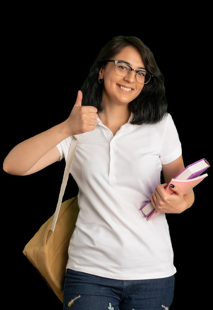 International student smiling and pointing